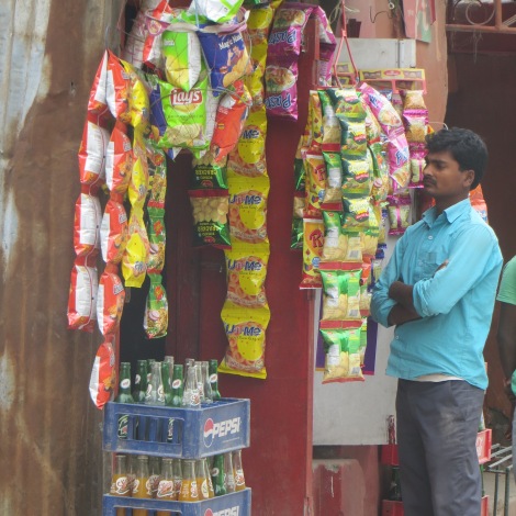 Small street-side shop selling chips and sweets. There are hundreds of these in Kathmandu